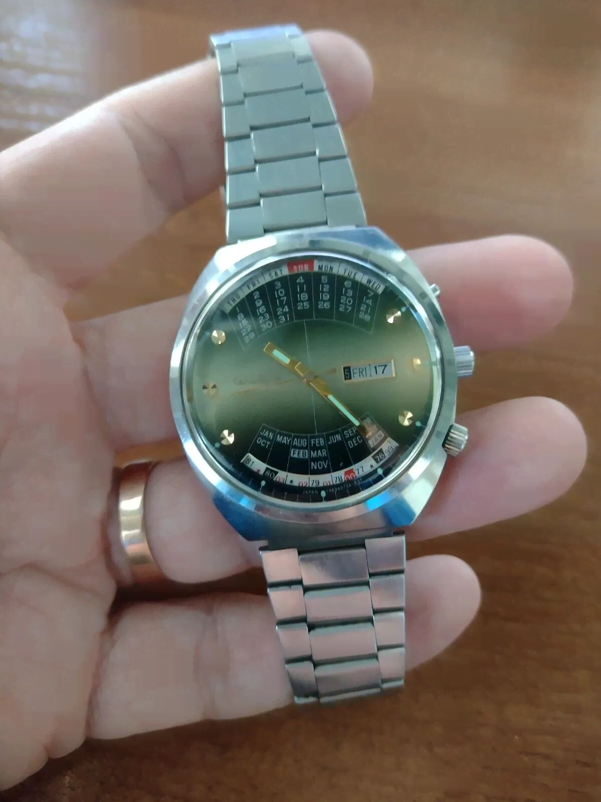 Orient College mechanical watch with perpetual calendar, automatic winding.